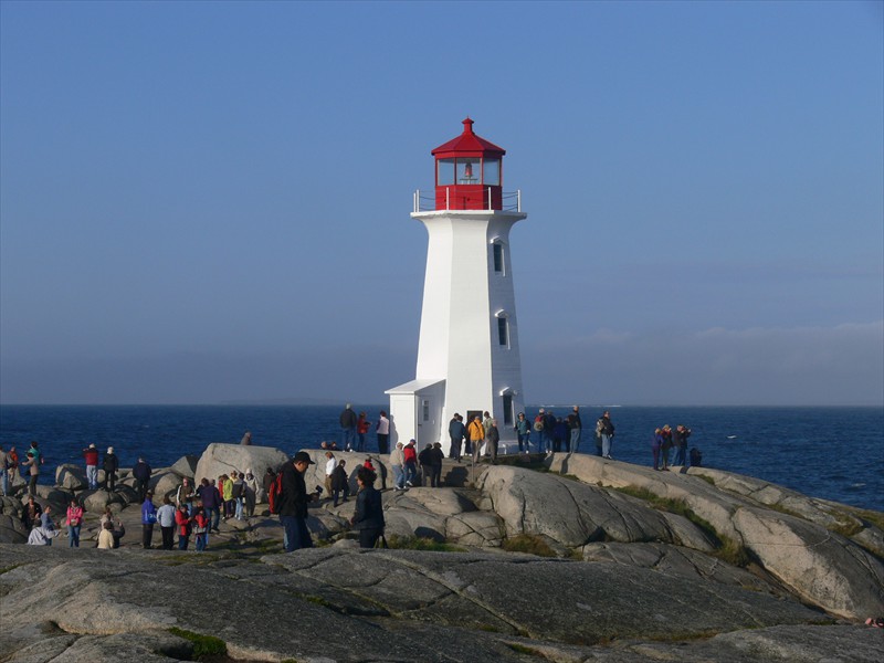 People swarm over the lighthouse